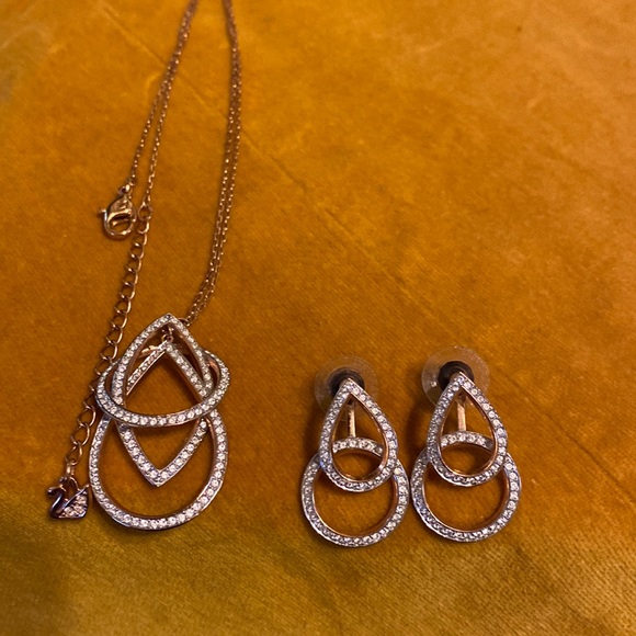 Swarovski crystal earring and necklace set.Rose gold tone. 18” w/extender.